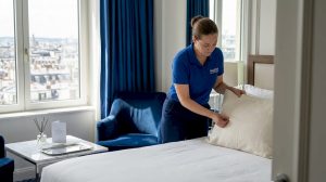 Housekeeping in luxury suite using safe cleaning.