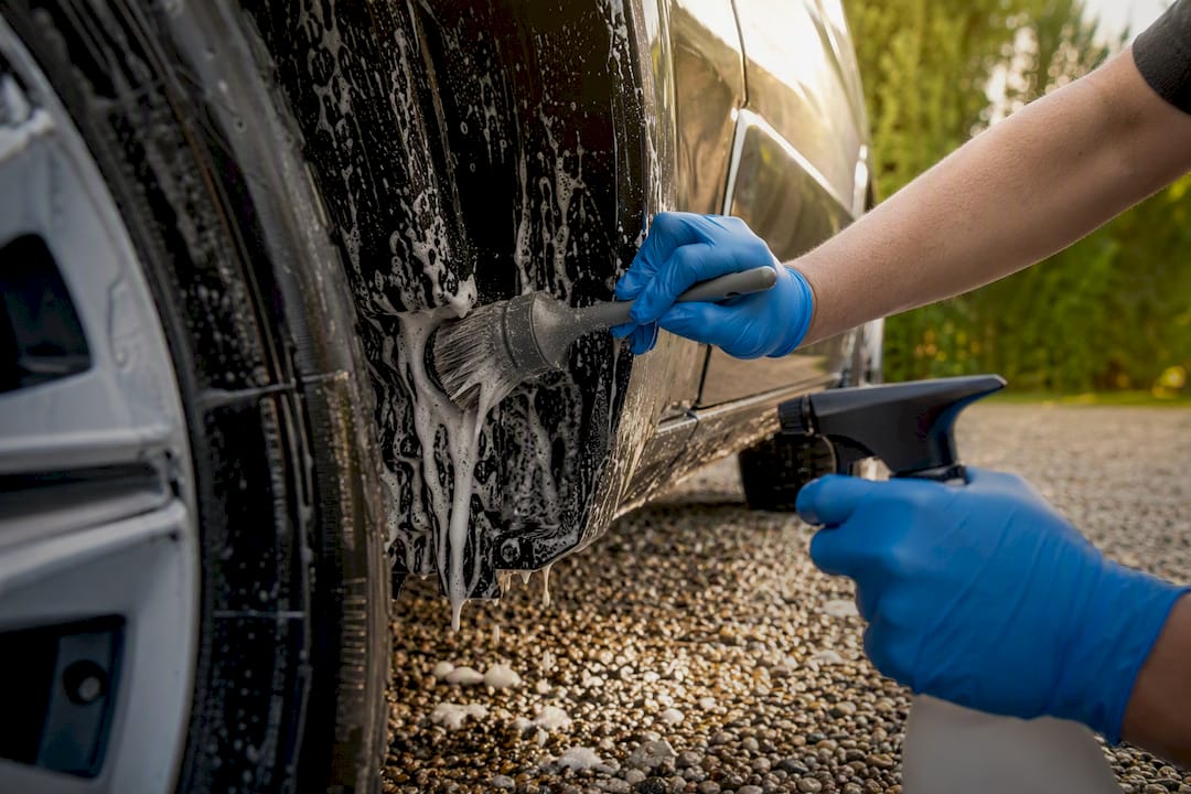 Cleaning skunk oil from car wheel well